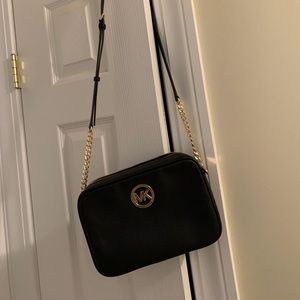 Michael Kors black gold crossbody like new